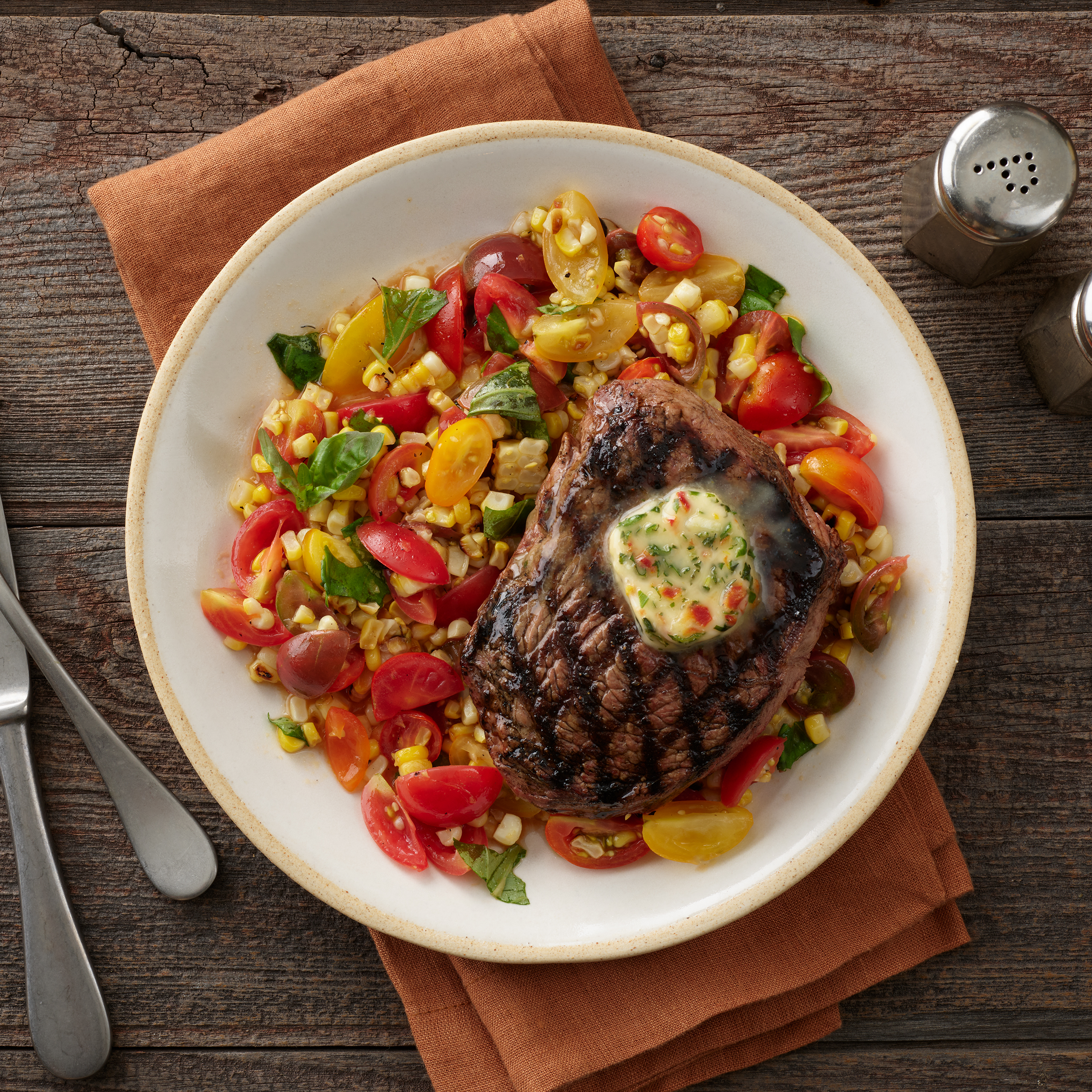 Grilled Sirloin with Late-Summer Tomato-Herb Butter & Corn Tomato Salad
